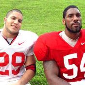 # 29, Sammy Maldonado and #54, Scott Smith, relax after a hard practice.