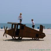 Ocean City - A young Orville and Wilbur inspect their craft before they take flight.