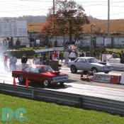 Polished 1963 Ford Falcon smokes the primer off of a fast 1983 Ford Mustang budget racer.