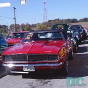 1968 Chevrolet Camaro RS rag top in line to race.