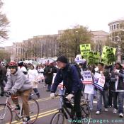 Two bikers join the march.