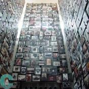 Called the "Tower of Faces" this room has four sides with many different pictures of people.