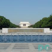 West to East View of the World War II Memorial. 4,000 sculpted gold stars on the Freedom Wall. Lincoln Memorial in the background.