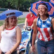 Smiling umbrella girls.