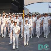 Naval Academy cadets march in tight formation in Navy-Marine Corps Memorial Stadium.