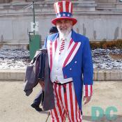 Uncle Sam gives warm smile.