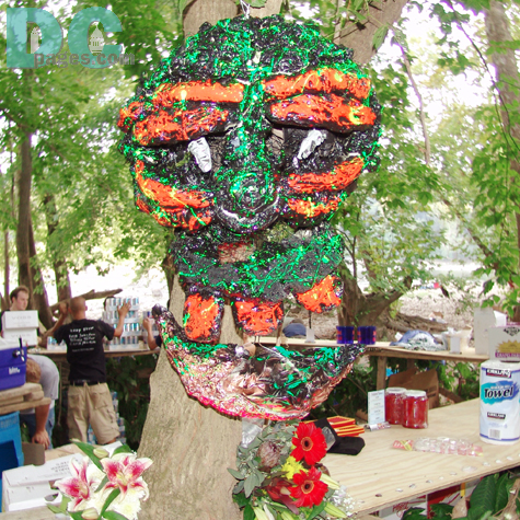 A jungle mask decorates the main bar of the Jungle party. 