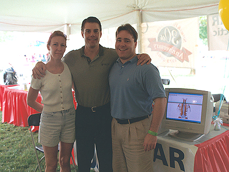The chiropractors tent, with three doctors at your fingertips ready to set up a free session.
