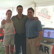 The chiropractors tent, with three doctors at your fingertips ready to set up a free session.