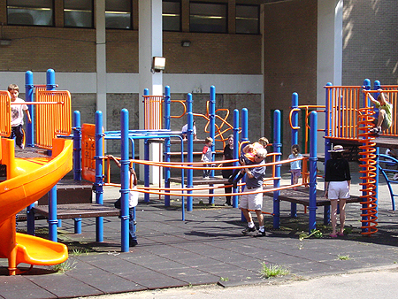 Both children and their parents took a quick break to enjoy the playground.