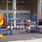 Both children and their parents took a quick break to enjoy the playground.