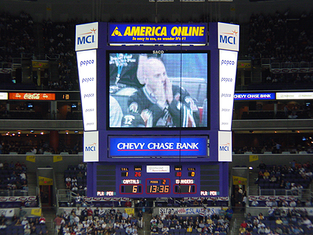 A close-up on the Jumbo Tron is the reward for this fans support for the Caps.