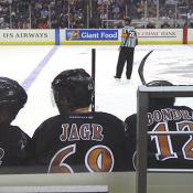 Kip Miller and Jagr discuss strategies while taking a quick breather.