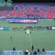 Both teams lined up in front of the crowd for the playing of the National Anthem.
