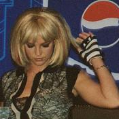Britney Spears tries to avoid a question about her famous "Madonna Kiss" at the VMA awards.