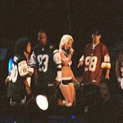 Britney was accompied by several dancers wearing Washington Redskins and New York Jets jerseys.