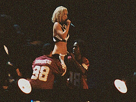 Britney gets a little lift from some of her dancers.