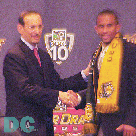 Troy Roberts, selected 8th overall by the Los Angeles Galaxy, poses with MLS Commissioner Don Garber.