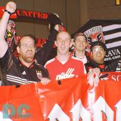 DC United fans demonstrating their passion for the home team.