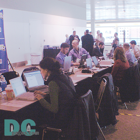 Outside in the media room, reporters and journalists from all over the world work tirelessly to meet deadlines.