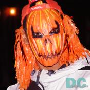 A you man transformed into a Pumpkin Head by a ghastly orange moon.