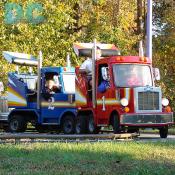A couple of truckers wave during a mini convoy. "10-4" "Good Buddy!!"