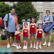These parents know how to keep track of their four children, matching fourth of July shirts.