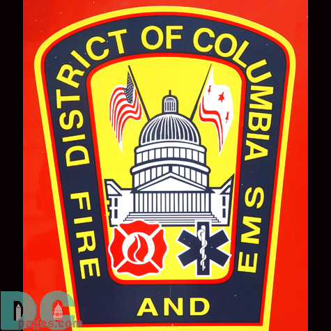A DC Fire and EMS Emblem found on the side of a fire truck parked on the Mall.