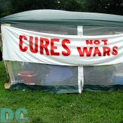 An informational tent on an Anti-War humanitarian aid group.