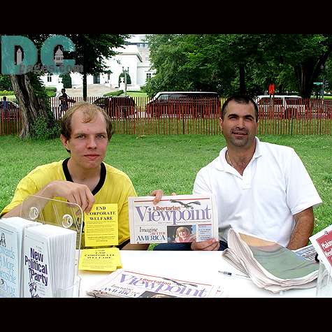These two men hand out their Libertarian newspaper, the Libertarian Viewpoint, to promote and educate the public about their viewpoints.