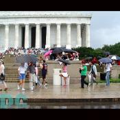 People stroll around the National Mall, often stopping here in front of the Lincoln Memorial 