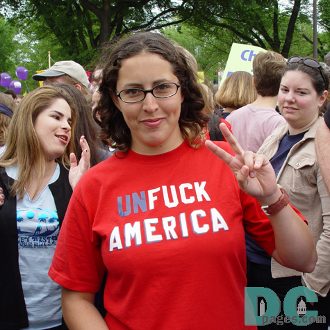 This marcher makes her feelings clear, with her hand making a peace sign and her shirt asking for a turnaround for America.