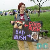 An MIT student shows her sign GOOD BUSH [picture of a woman below the waist] and BAD BUSH [picture of President Bush]