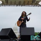 The US Capitol serves as a backdrop during Ani DiFranco's performance at the March for Womens Lives.