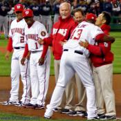 Washington Nationals relief pitcher Jesus Colome hugs the Nats training staff.