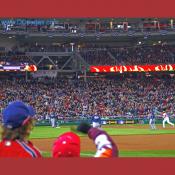 Braves pitcher Tim Hudson's throwing error allows Washington Nationals Cristian Guzman to advance to third base.