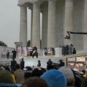 U2 performs at the Lincoln memorial under an overcast sky