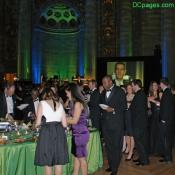 Partygoers sample the organic food.