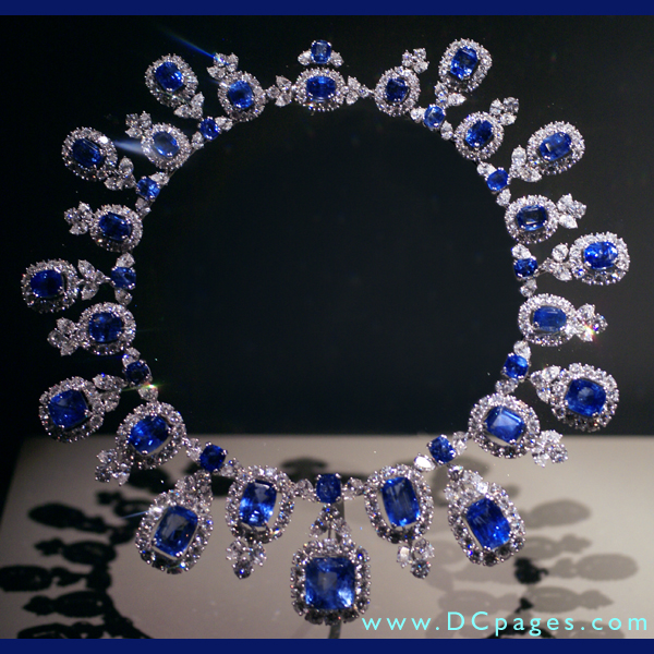 Hall Sapphire Diamond Necklace - This exquisite necklace features 36 matched sapphires from Sri Lanka totaling 195 carats. Their deep sky-blue color contrasts brilliantly with a sparkling sea of 435 diamonds weighing 84 carats.