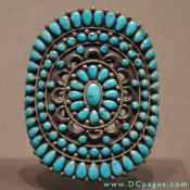 Turquoise Bracelet made by the Native American Zuni tribe. It is rare and valuable in finer grades and has been prized as a gem and ornamental stone for thousands of years owing to its unique hue.