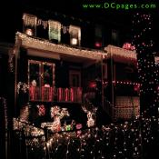 Strands of icicles, candy canes, window displays, reindeer, and white lights brighten up this home.