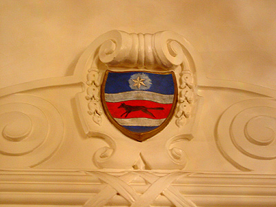 Beautifully crafted mantels are all over this Embassy