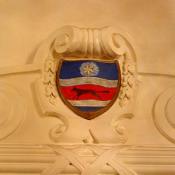 Beautifully crafted mantels are all over this Embassy