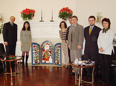 The staff at the Bulgarian Embassy gather around the beautiful decorations