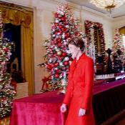 The First Lady prepares to address her guests and explains the origin of all the decorations throughout the White House.