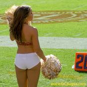 Redskins cheerleader, Shannon watches the Cardinals enter Fedex.