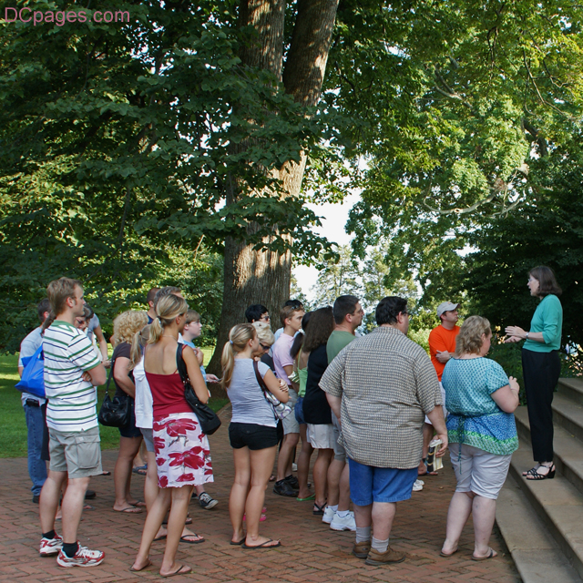 Visitors at Monticello listen to a docent