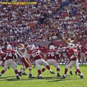 Kurt Warner (13) pass is rushed and falls incomplete.