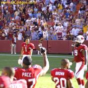Neil looks up at the scoreboard. Redskins 21 Cardinals 19.