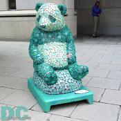 In front of 1300 New York Ave. one can find "Coin Panda" by Dakota Warren. The panda's mosaic-like art design is one of a kind.